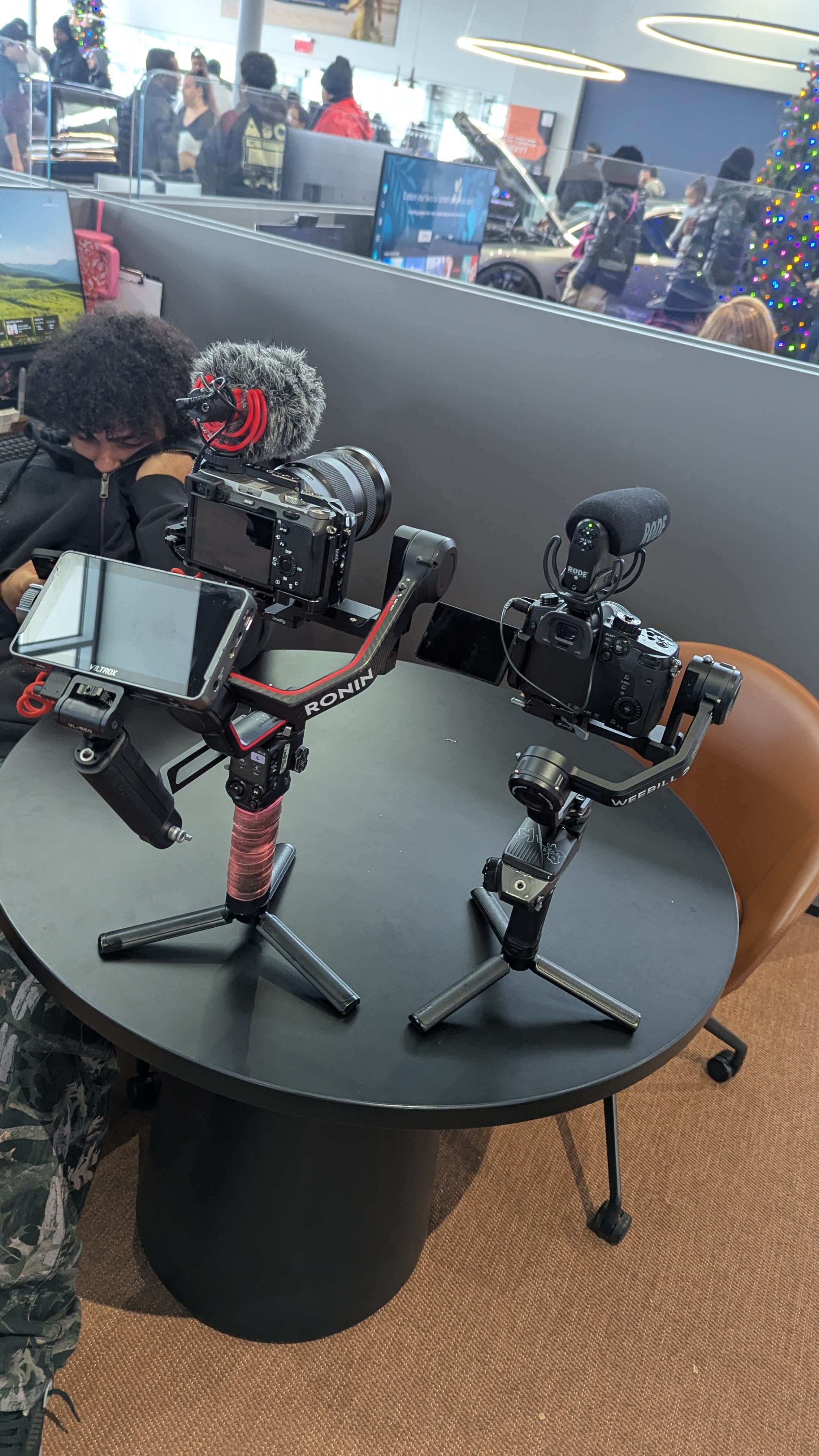 30foot Atlanta video production gear—gimbal-mounted mirrorless cameras with shotgun mics staged on location at a branded event